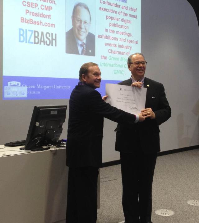 Joe Goldblatt (l) Makes a Presentation to Richard Aaron (r)
