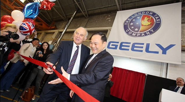 Business secretary, Vince Cable (left) cuts a ribbon with Geely Chairman Li Shufu as they officially restart production of TX4 model Read more: http://www.dailymail.co.uk/news/article-2417890/Black-cab-manufacturer-London-Taxi-Company-restarts-production